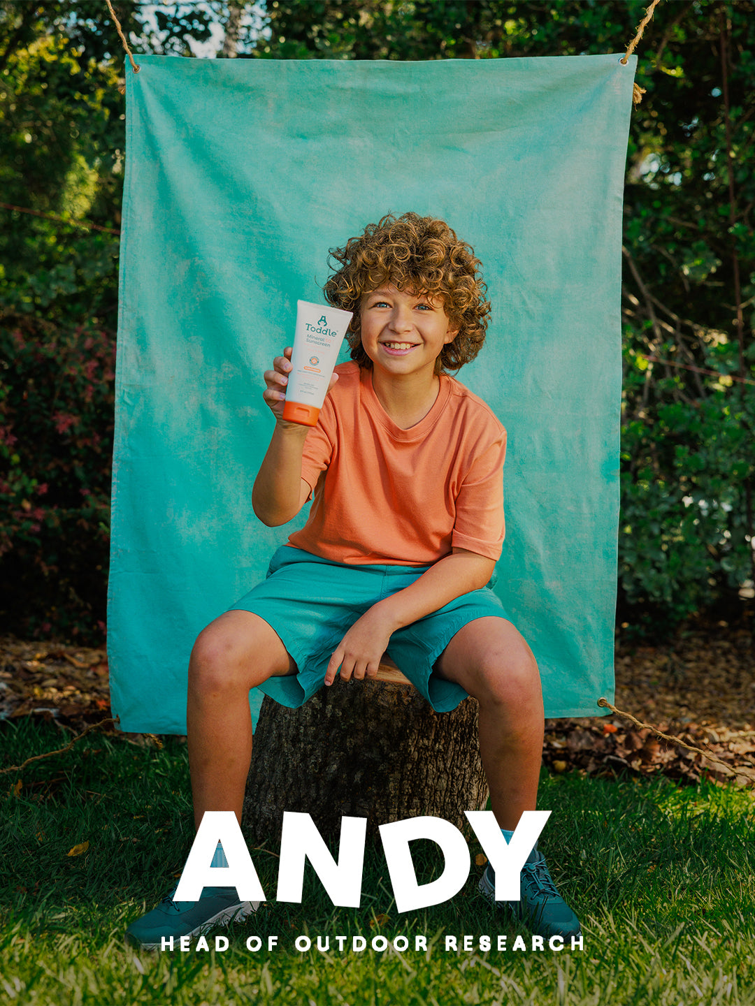 Andy holding Toddle Skincare SPF 50 suncream — safe sun protection